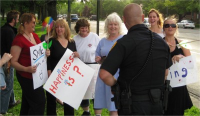 radical-happy-group-busted-by-cop Radical Group Busted by Cop for Unsafe Happiness Strike