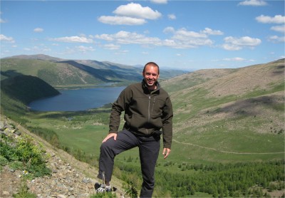 This is the first of a series of 8 lakes, only 5 or 6 of which still have water. I'm standing on a steep mountainside in this picture, and the driver is telling me to move back to level land.