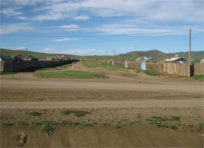 Not everyone in country towns lives in gers open to the world. This little town has small cabins with privacy fences throughout.