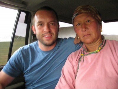 This woman hitched a ride with us. She jumped off a horse-pulled wagon, and the wagon driver was gone before this woman even asked us for a ride. It is poor manners to not help a neighbor, so it was no wonder they assumed correctly that we would give her a lift.