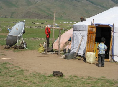 Many gers have satellite dishes. From what I was told, the nomadic families pickup several channels for free with these basic looking dishes.