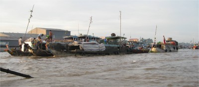 On the Mekong Delta, dozens of boats converge, creating a "floating market."