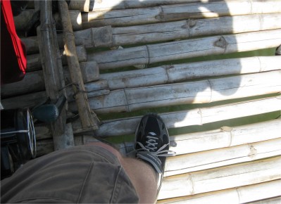 At the time, it seemed like a perfectly good idea to ride across this bamboo bridge, held together with rubber inner tubes and thin wiring, on a motorbike.