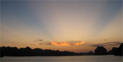 For whatever reason, Halong Bay was a fantastic location for pictures of the sky. You can see the sun hidden behind a cloud discus, and miraculously my little point and shoot camera picked up some of the brilliance of colors emanating from the merger.