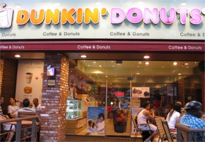 A Dunkin' Donuts in Seoul has mostly Western patrons. We are addicted to this stuff! When I visited Japan in 2001, I couldn't find a decent donut, just an unsweetened poor attempt at one. This year, however, I found my favorite, Krispy Kreme. American fast food is spreading around the world, setting the human race up for failure.