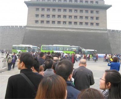 Just like Halong Bay in Vietnam, I found the logistical setup for moving throngs of tourists to the Great Wall absolutely machine-like. This long line moved so fast. As soon as a bus would load the seats, it left. The next bus would move forward, load every seat, and leave.